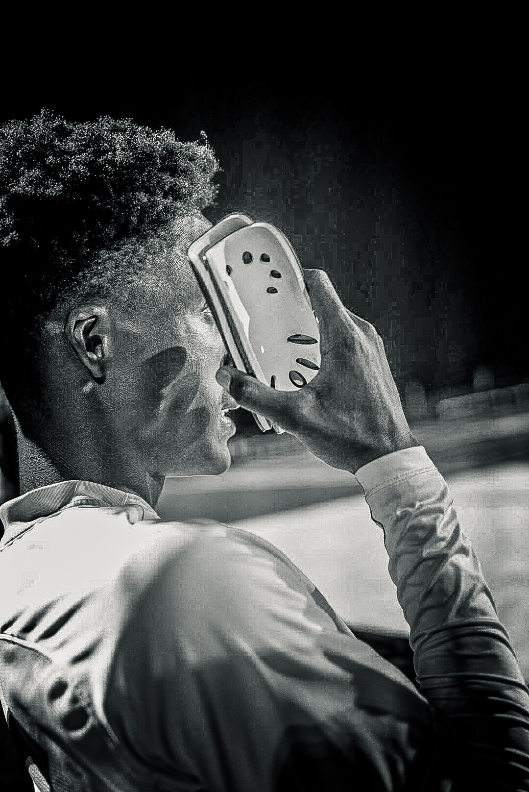 Black and white photograph by Fedeli Photos of an athlete preparing before a match